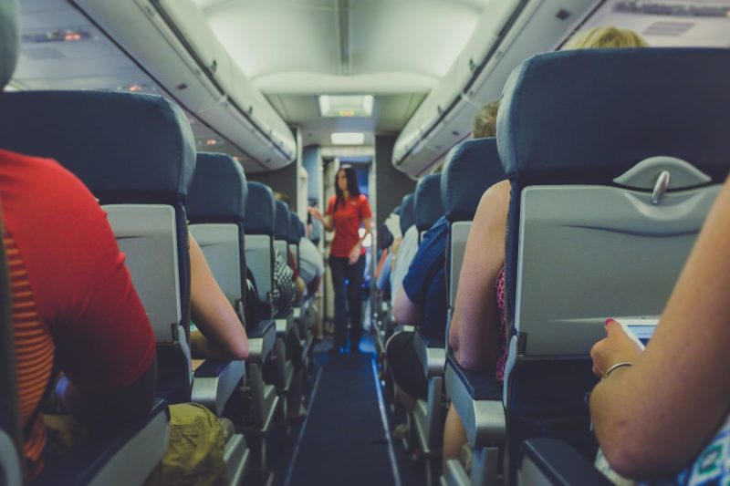 Various passengers on a plane.