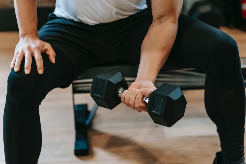 a man doing a bicep curl