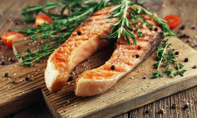 Grill salmon on a cutting board